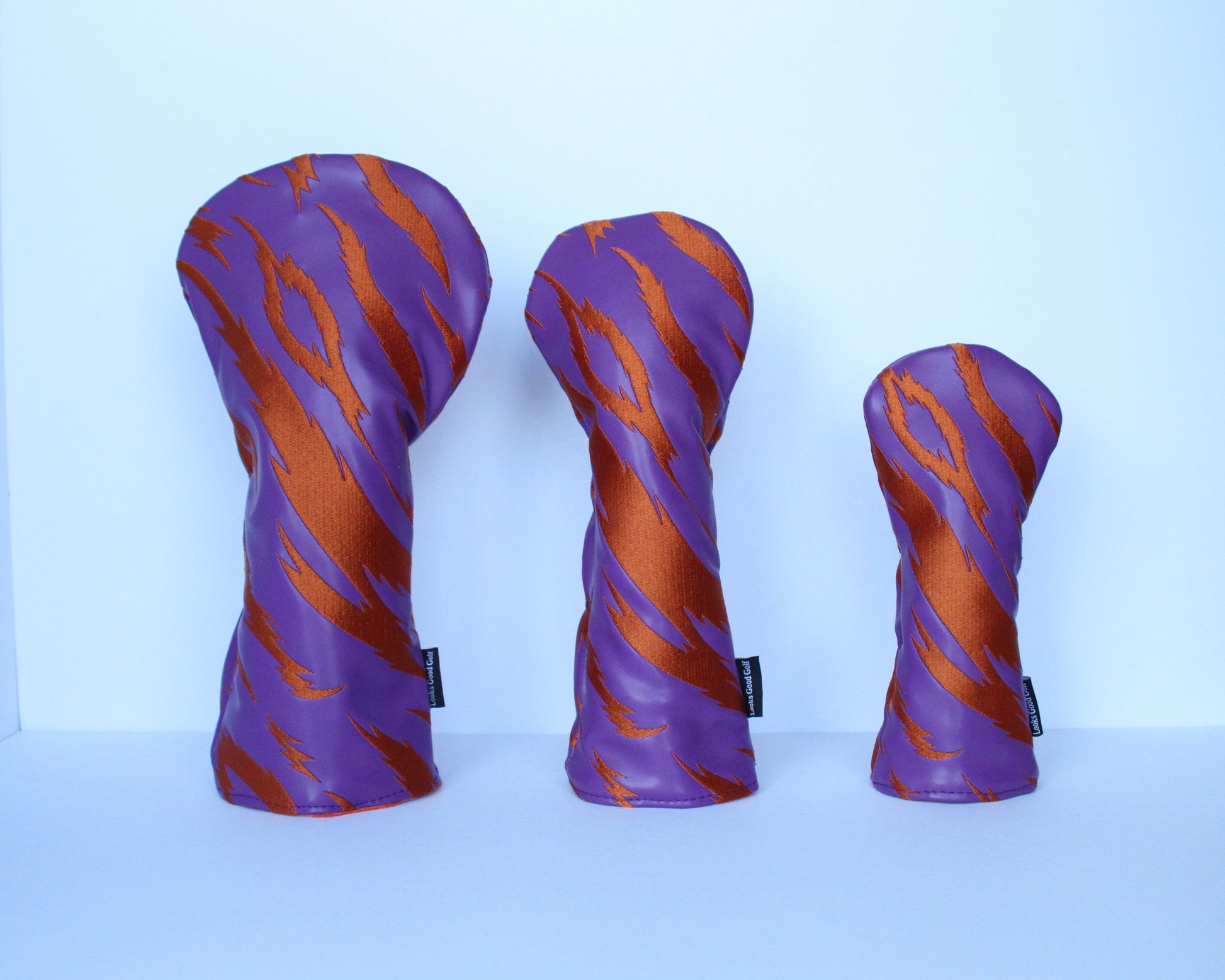 Purple and orange tiger stripe golf headcover 3-piece set front view by Looks Good Golf