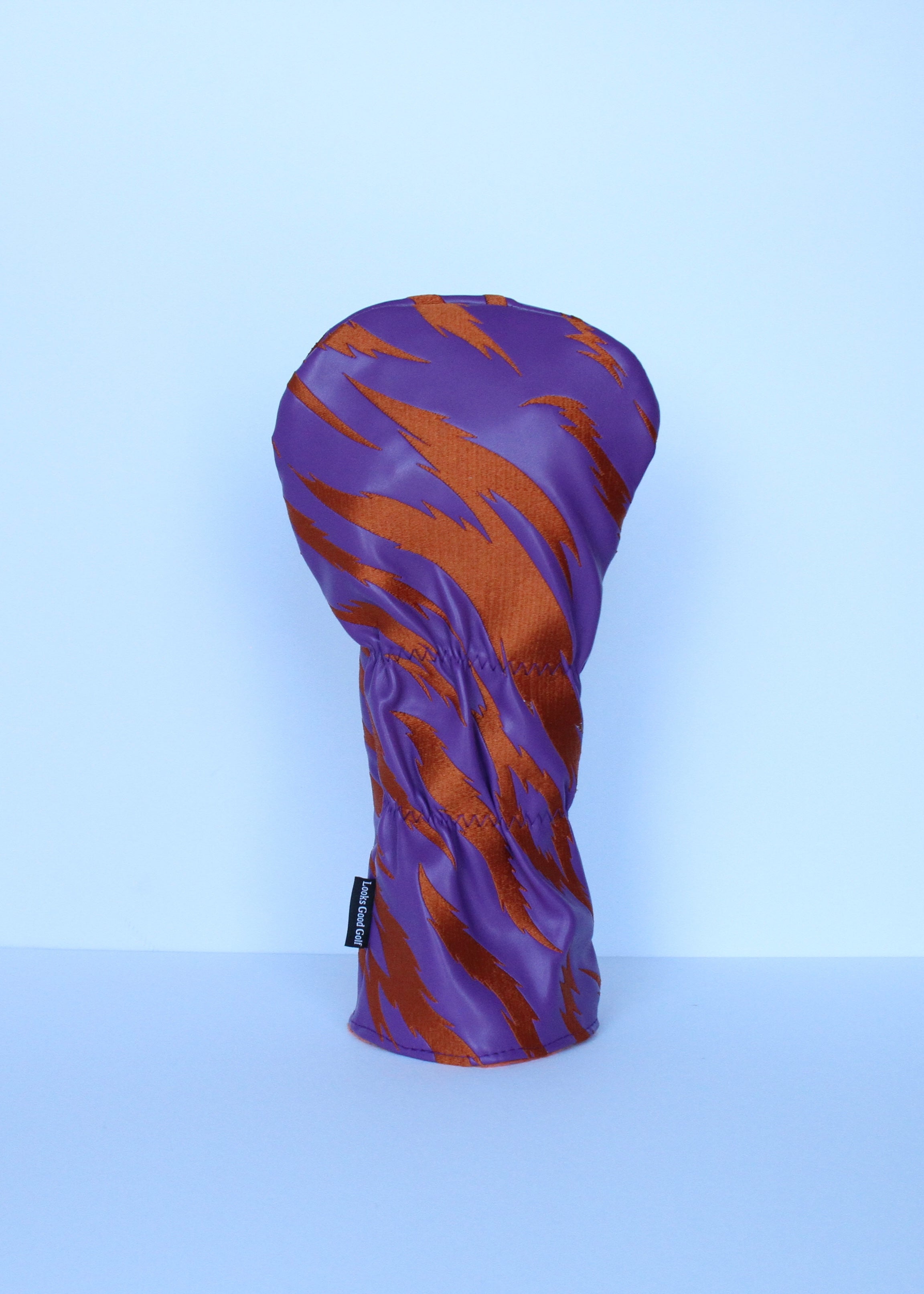 Orange and purple golf driver headcover with embroidered tiger stripes orange fleece lining