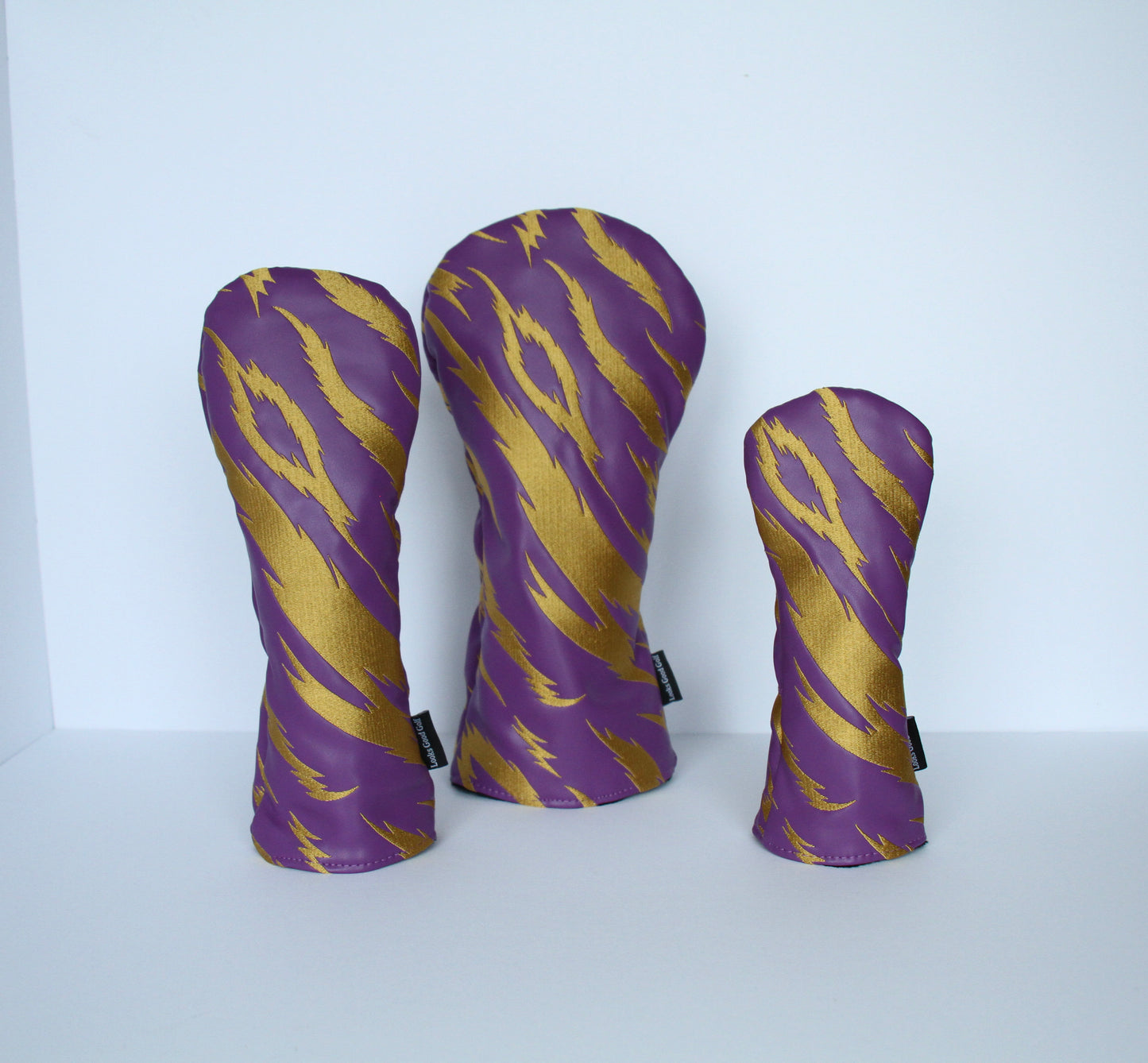 Purple and gold tiger stripe golf headcover 3-piece set grouped view by Looks Good Golf