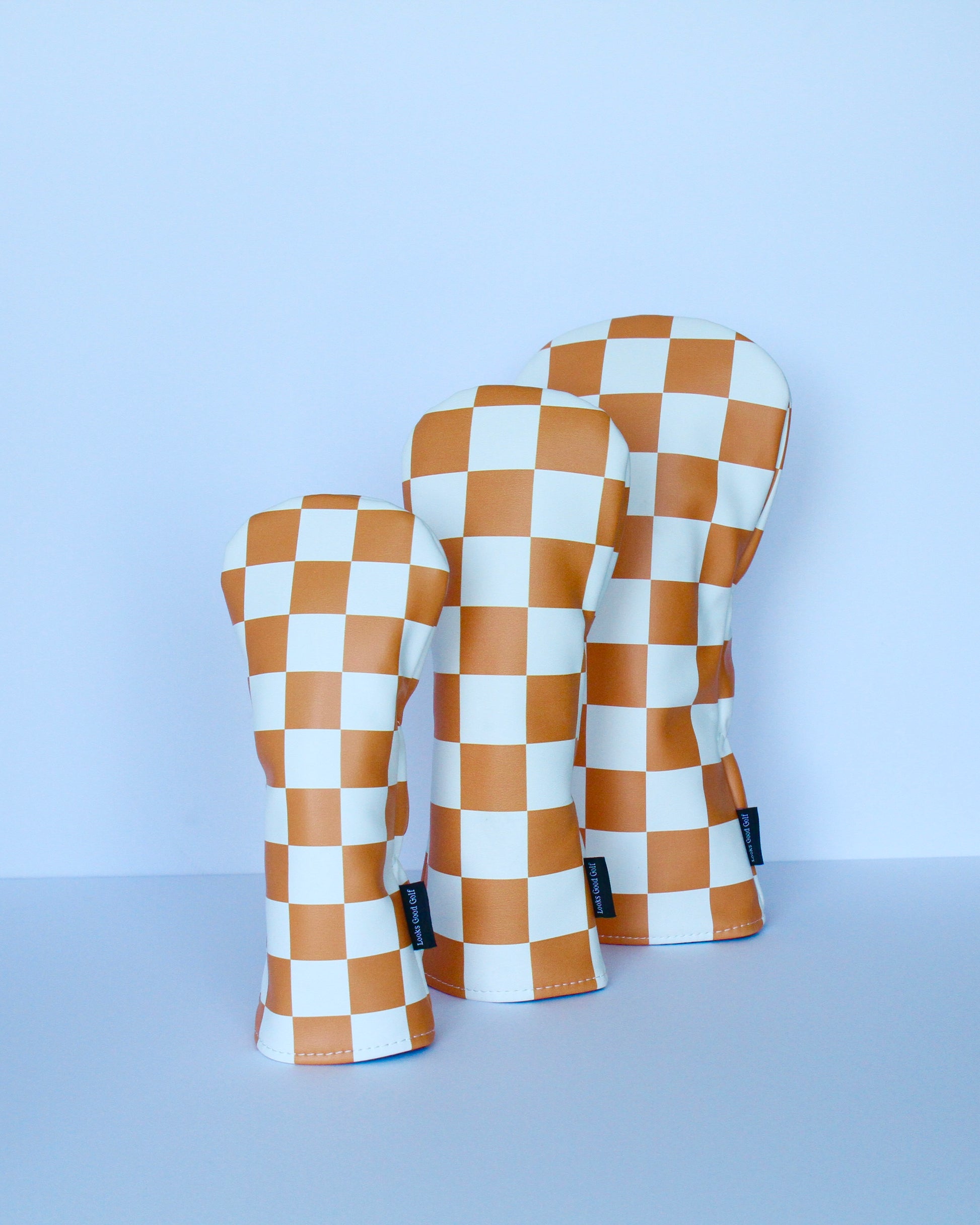 Orange and white checkerboard golf headcover 3-piece set side view by Looks Good Golf