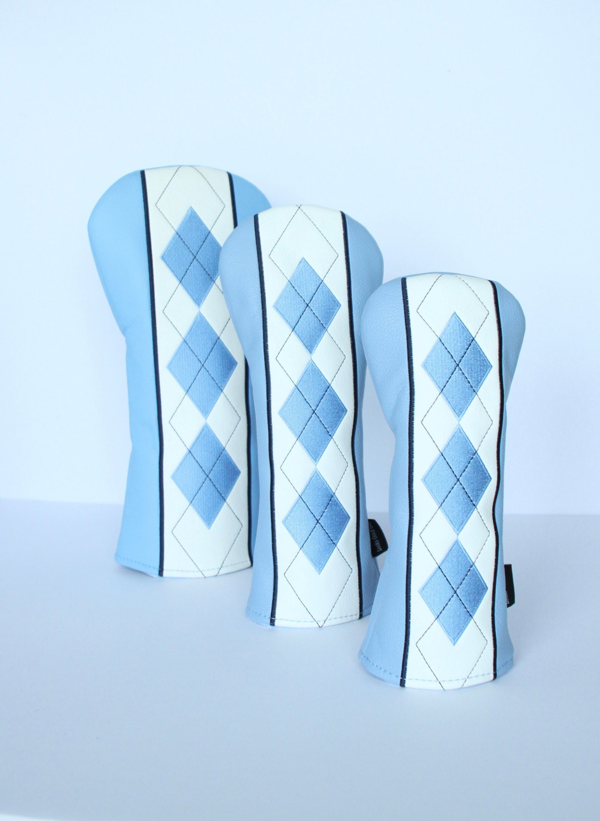 Sky blue and navy argyle golf headcover 3-piece set close-up view by Looks Good Golf