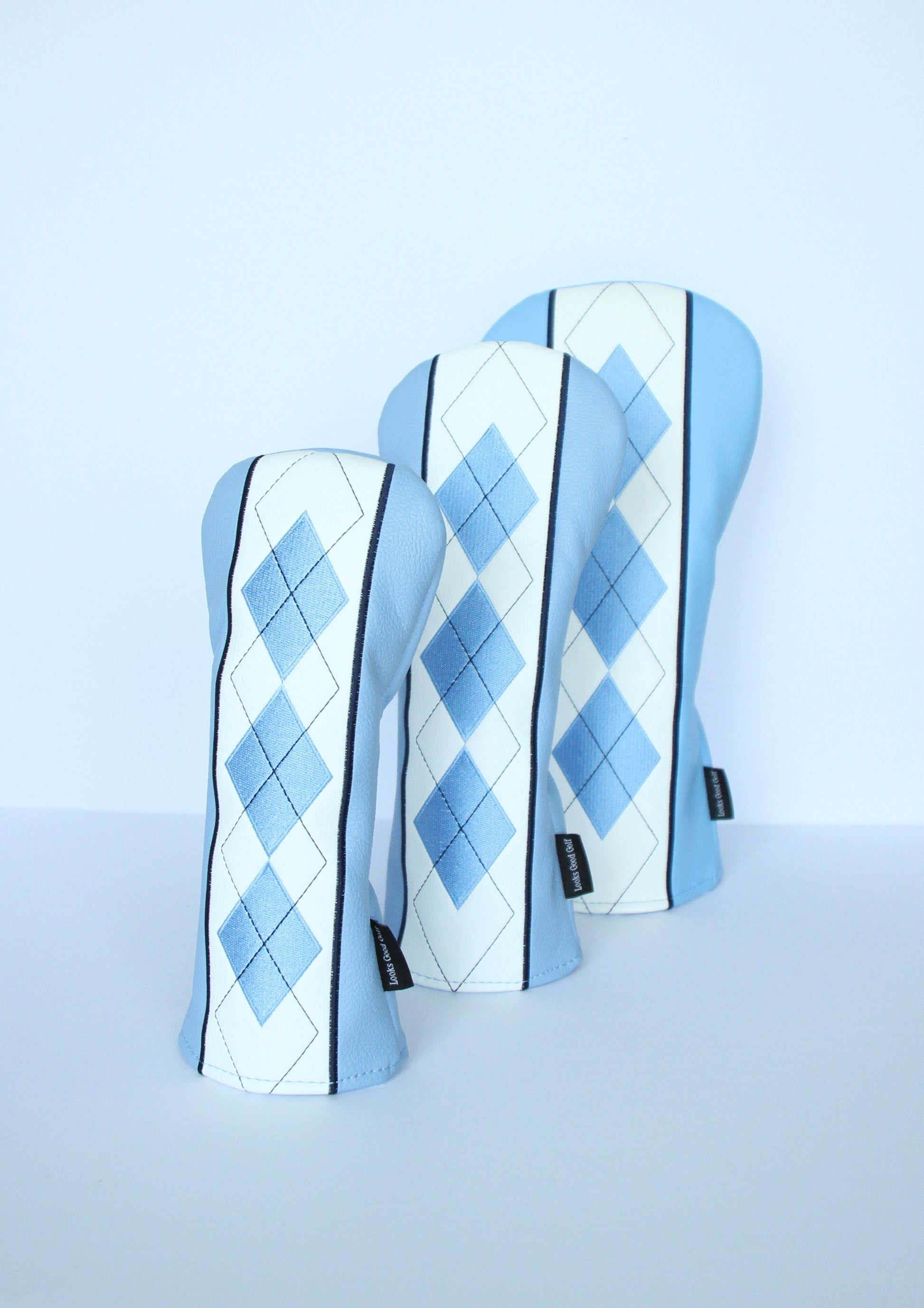Sky blue and navy argyle golf headcover 3-piece set angled view by Looks Good Golf