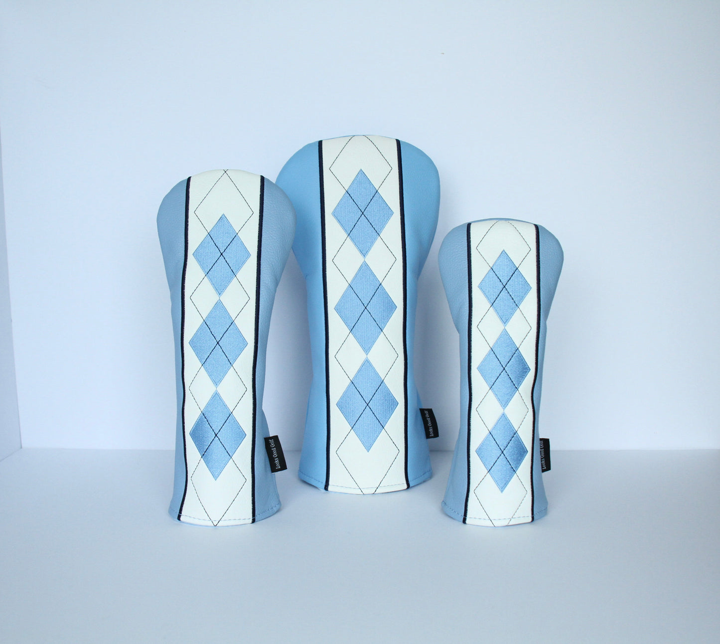 Sky blue and navy argyle golf headcover set side view by Looks Good Golf